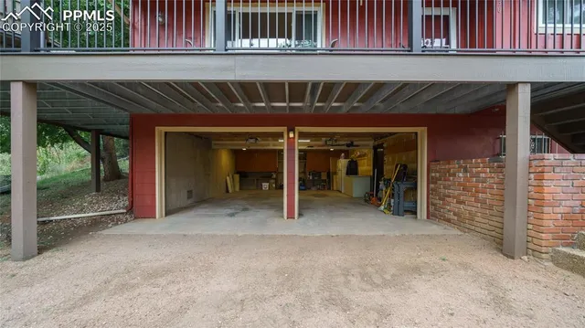 a view of a house with porch and furniture