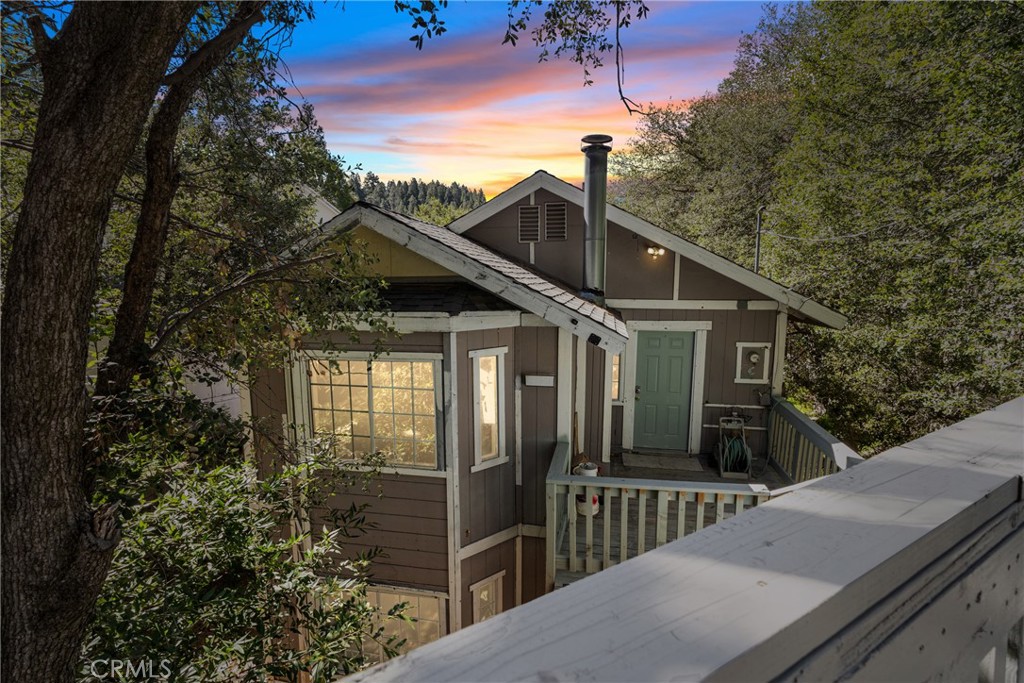 a front view of a house with yard