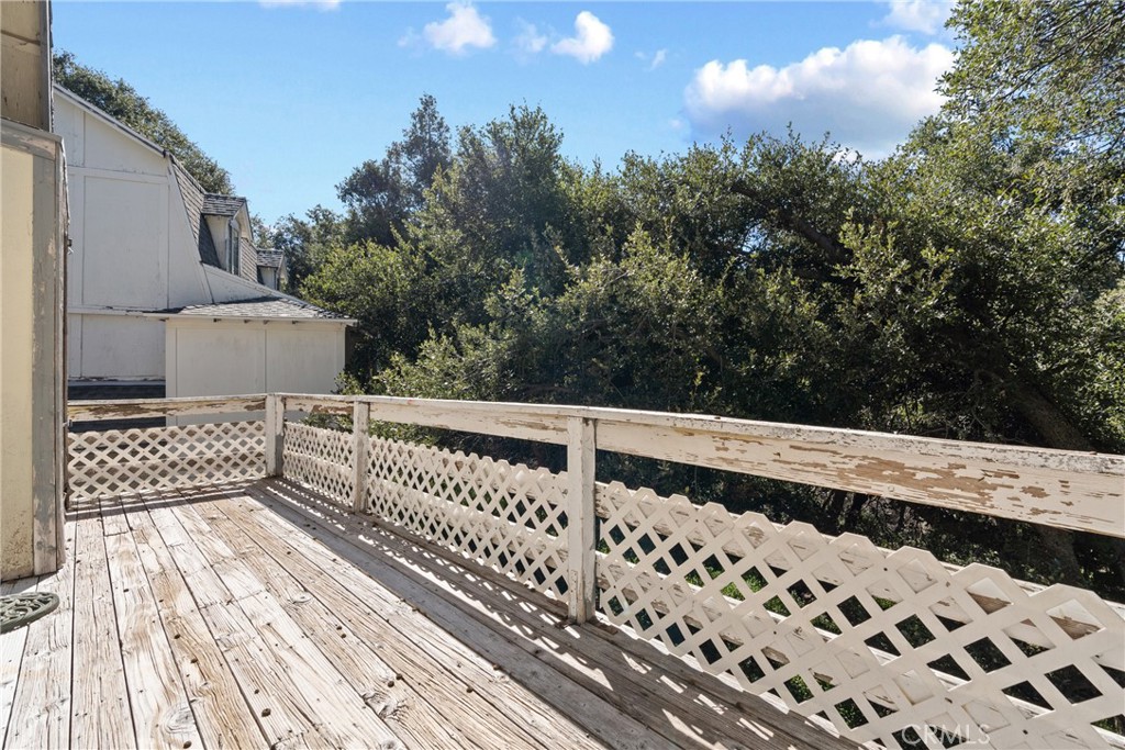 23561 Short Way Crestline, CA 92325 - Photo 17 of 18 a view of wooden balcony with outdoor space