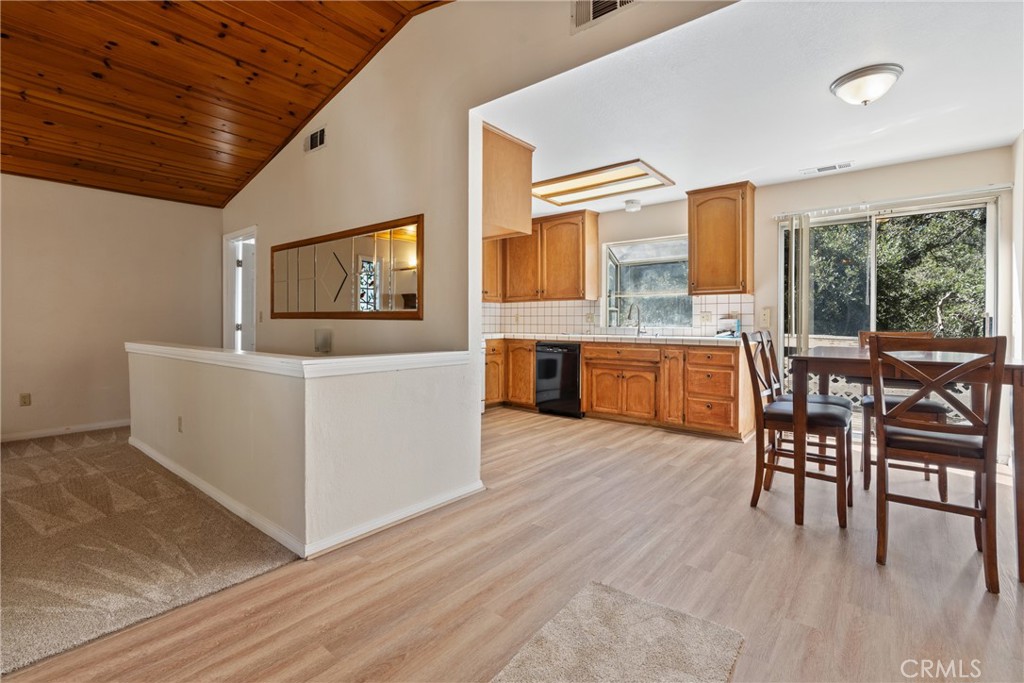 23561 Short Way Crestline, CA 92325 - Photo 6 of 18 a view of a dining room with furniture window and wooden floor