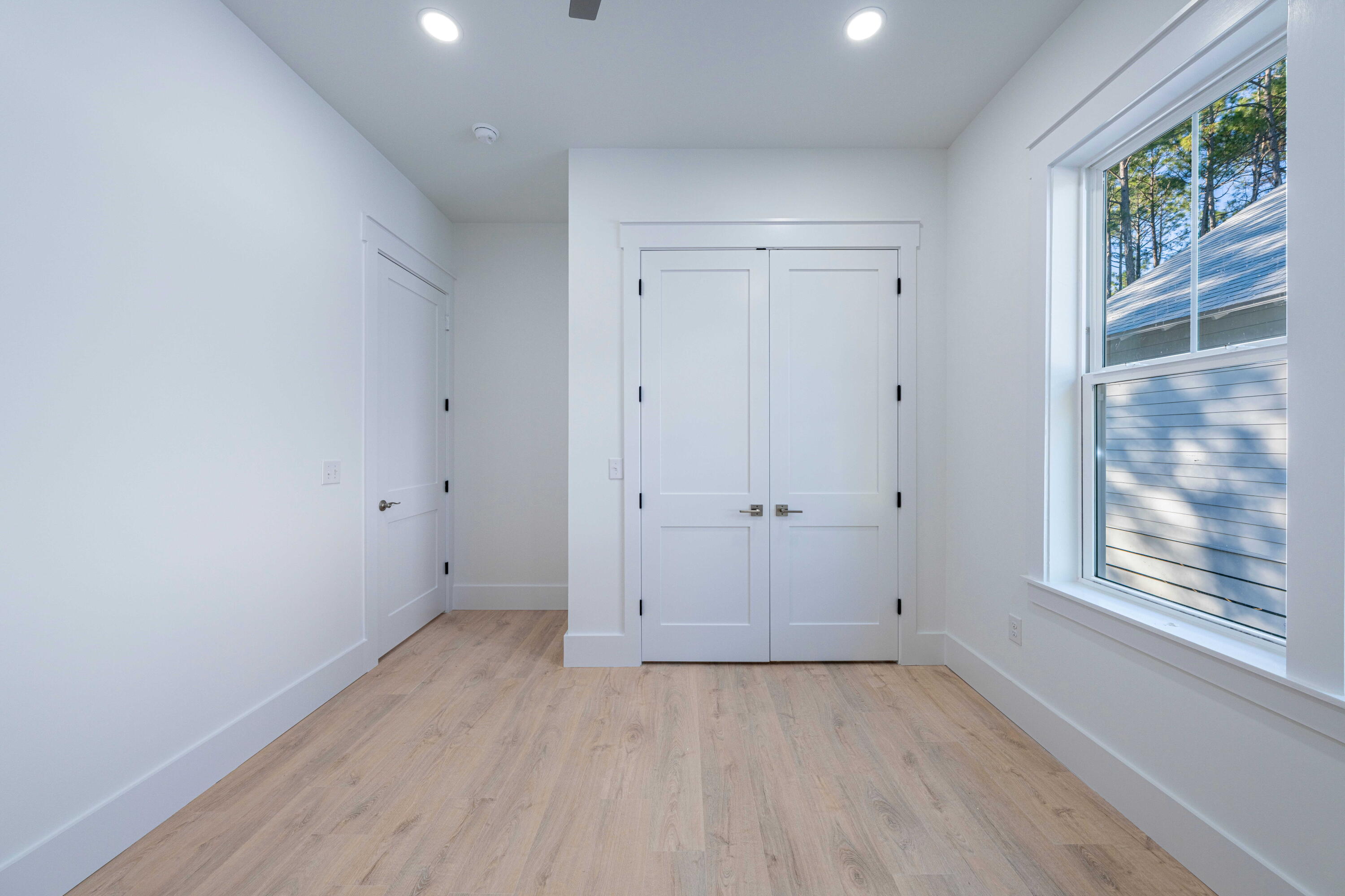 142 4th Street Santa Rosa Beach, FL 32459 - Photo 13 of 26 a view of an empty room with a window