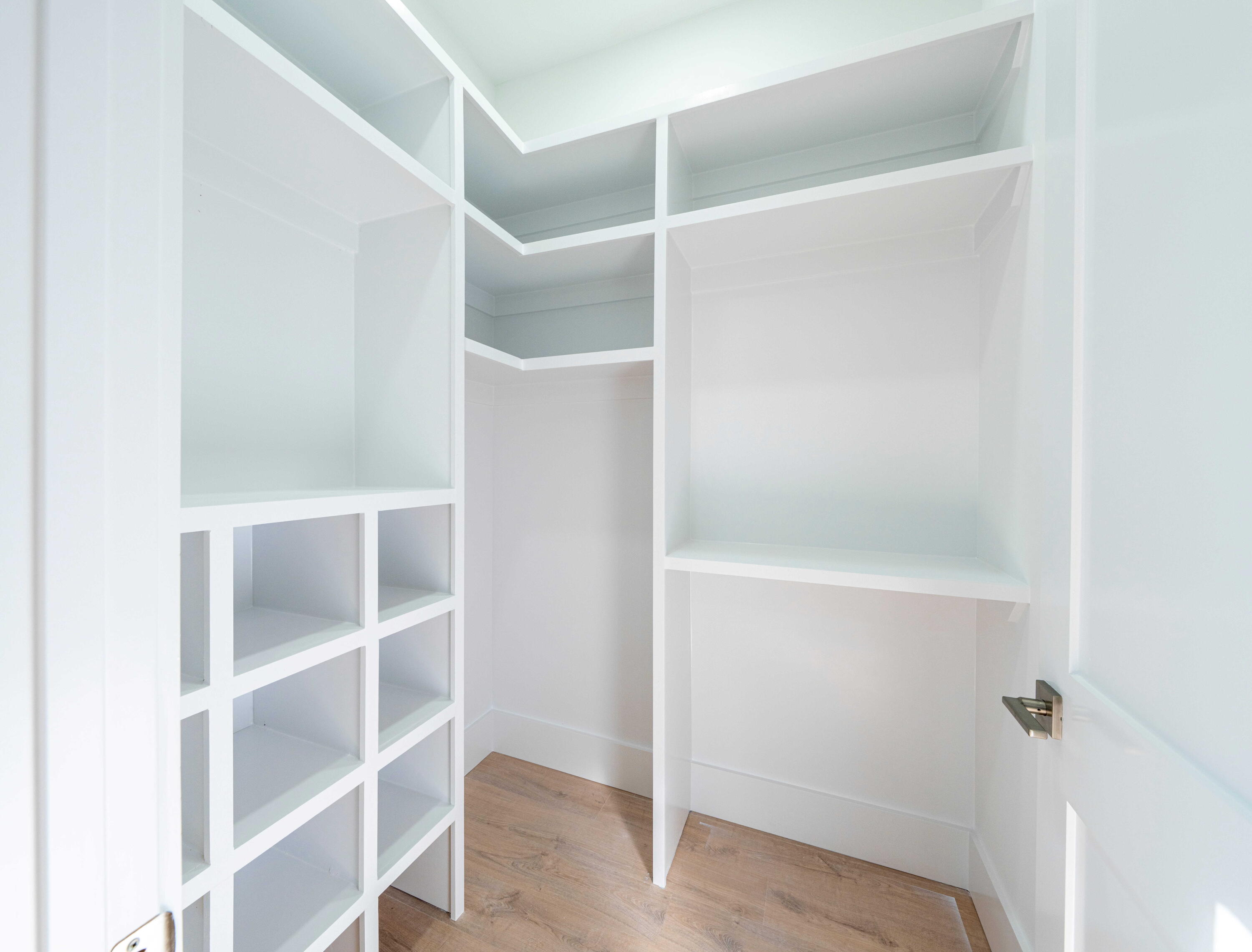 142 4th Street Santa Rosa Beach, FL 32459 - Photo 18 of 26 a view of an empty walk in closet