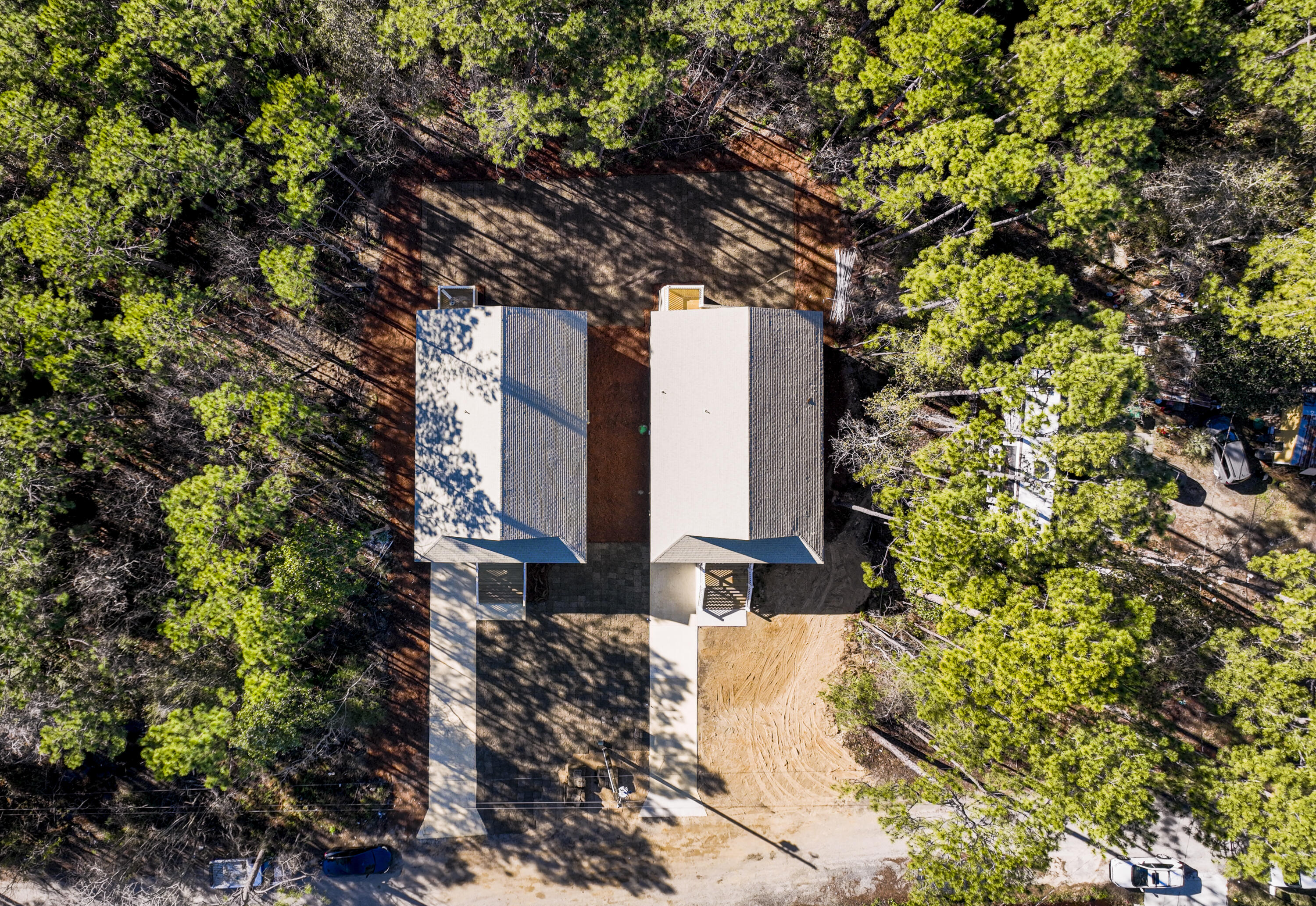 142 4th Street Santa Rosa Beach, FL 32459 - Photo 5 of 26 a tree in front of a house
