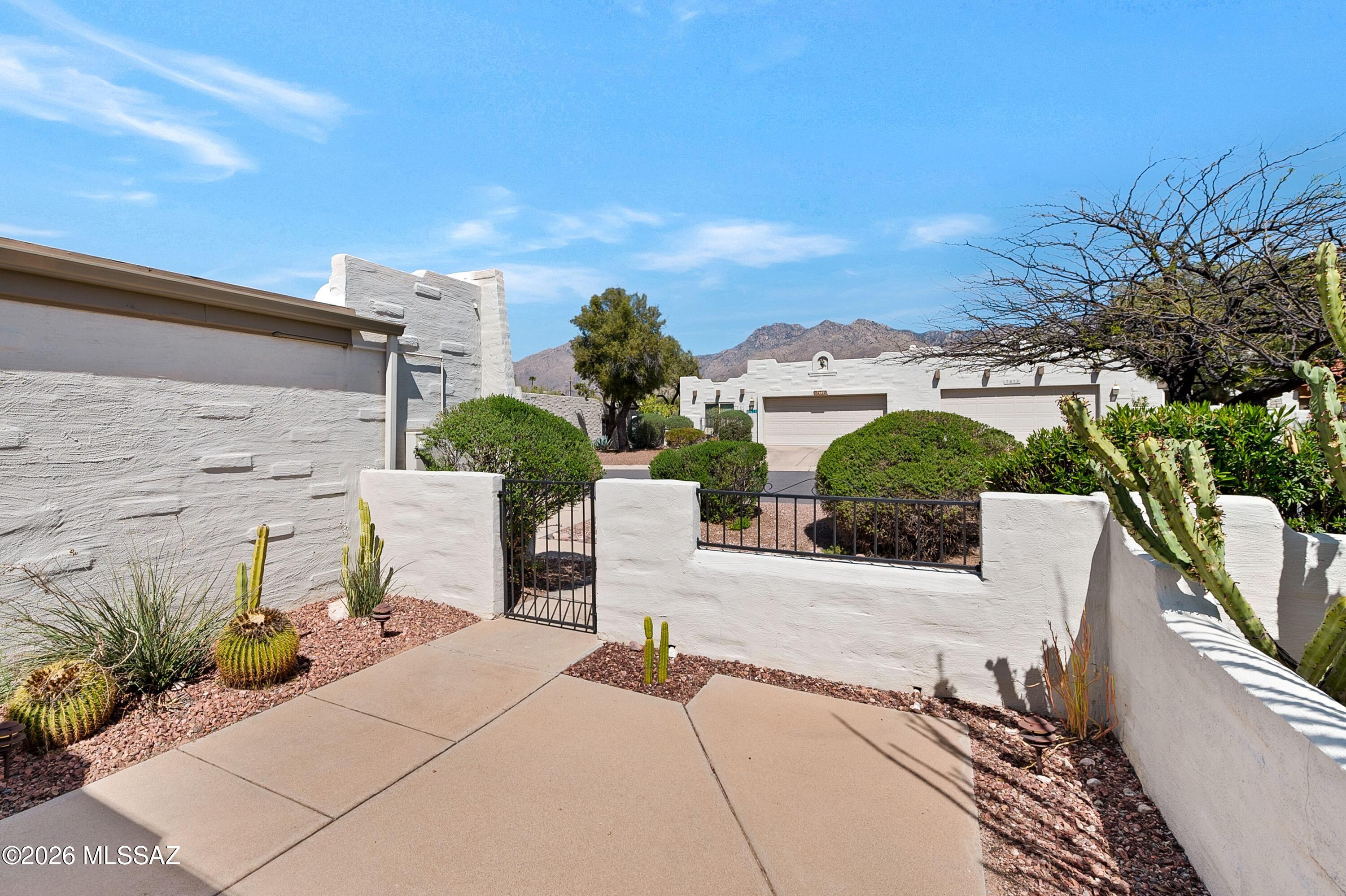 7408 East Wandering Road Tucson, AZ 85750 - Photo 3 of 25 a view of a terrace with sitting area