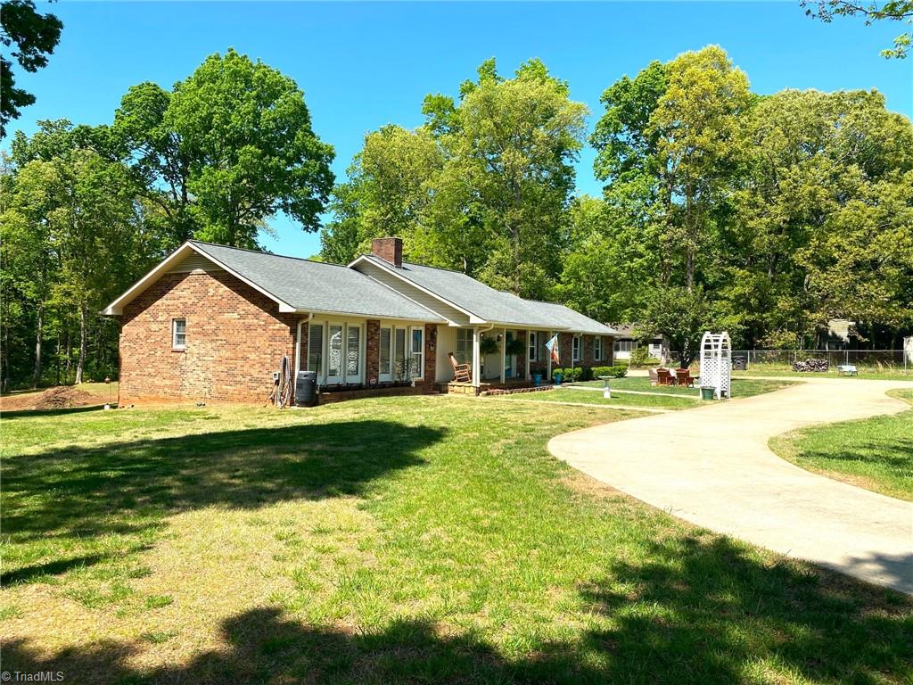 1350 Bethania-Rural Hall Road Winston-Salem, NC 27106 - Photo 1 of 29 This house absolutely has it all. 5 bedrooms and 3 full baths, an In-Law quarters with a separate entrance. It is a 3.7 acre site with outbuildings, fences and a large buffer of woods in back. It sits back from the road and is impressive to drive into with a large circle drive and access to a detached 3 car garage.
