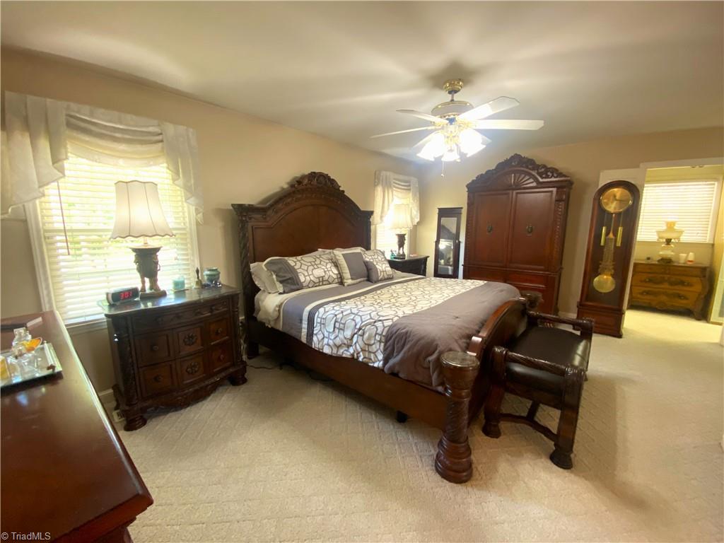 1350 Bethania-Rural Hall Road Winston-Salem, NC 27106 - Photo 4 of 29 The Primary bedroom is amazing and roomy. It includes what you see, a sitting room, an en suite full bathroom with separate tub and shower and a huge closet that runs the full width of the bedroom.