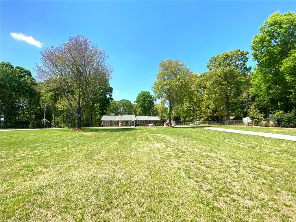1350 Bethania-Rural Hall Road Winston-Salem, NC 27106 - Photo 10 of 29 A deep set site sitting way back from the street makes for a grand entrance to this property.