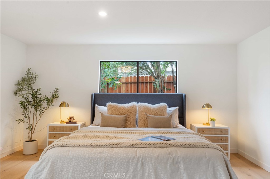 931 Camino Ramon Danville, CA 94526 - Photo 13 of 67 a bedroom with a bed and a window