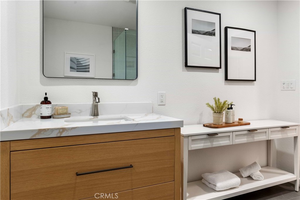 931 Camino Ramon Danville, CA 94526 - Photo 44 of 67 a bathroom with a sink and a mirror