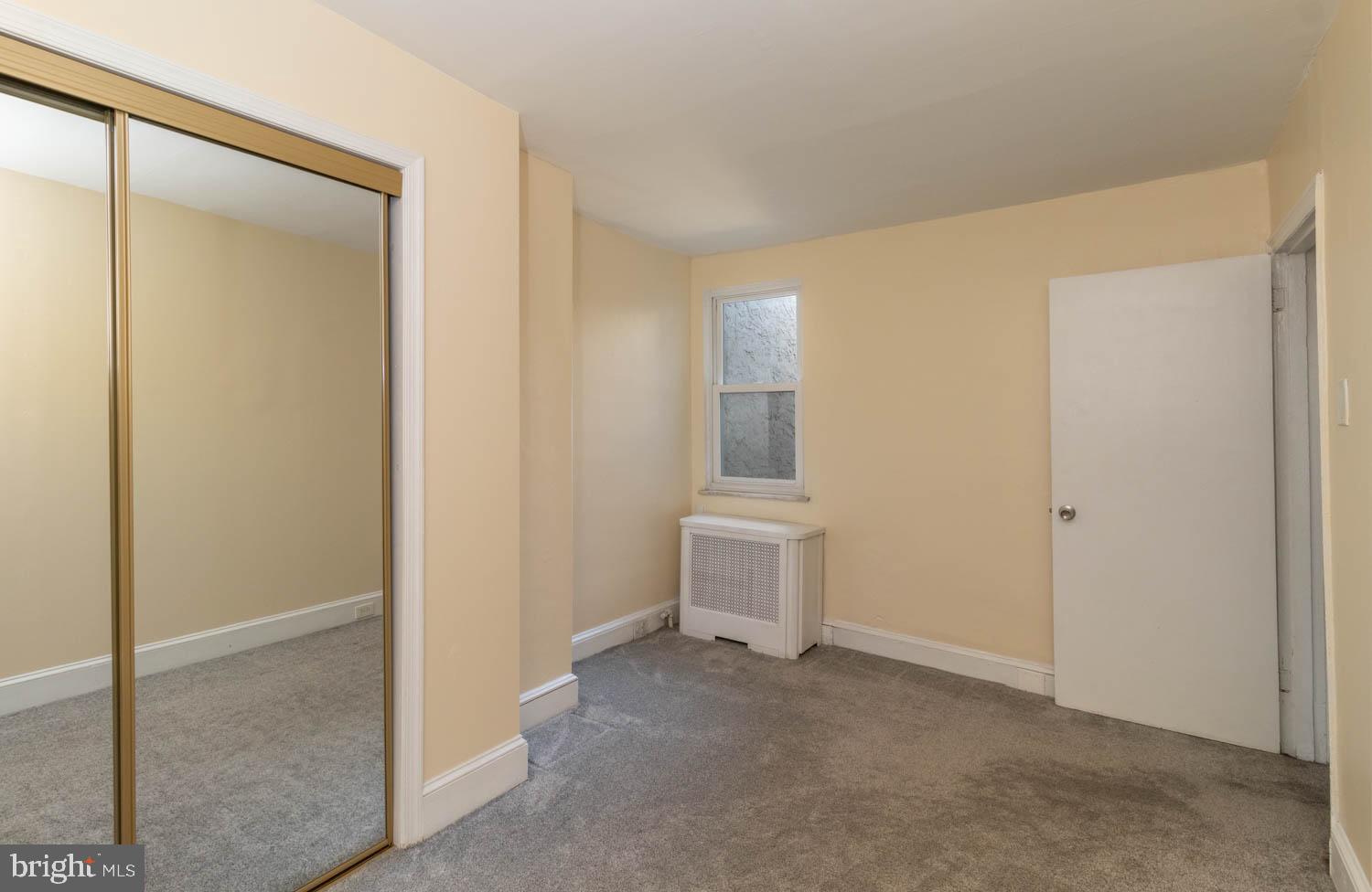 820 Tasker Street Philadelphia, PA 19148 - Photo 14 of 25 a view of a room with toilet and front door