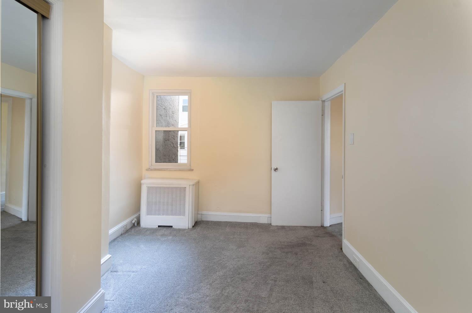 820 Tasker Street Philadelphia, PA 19148 - Photo 15 of 25 wooden floor and window in a room