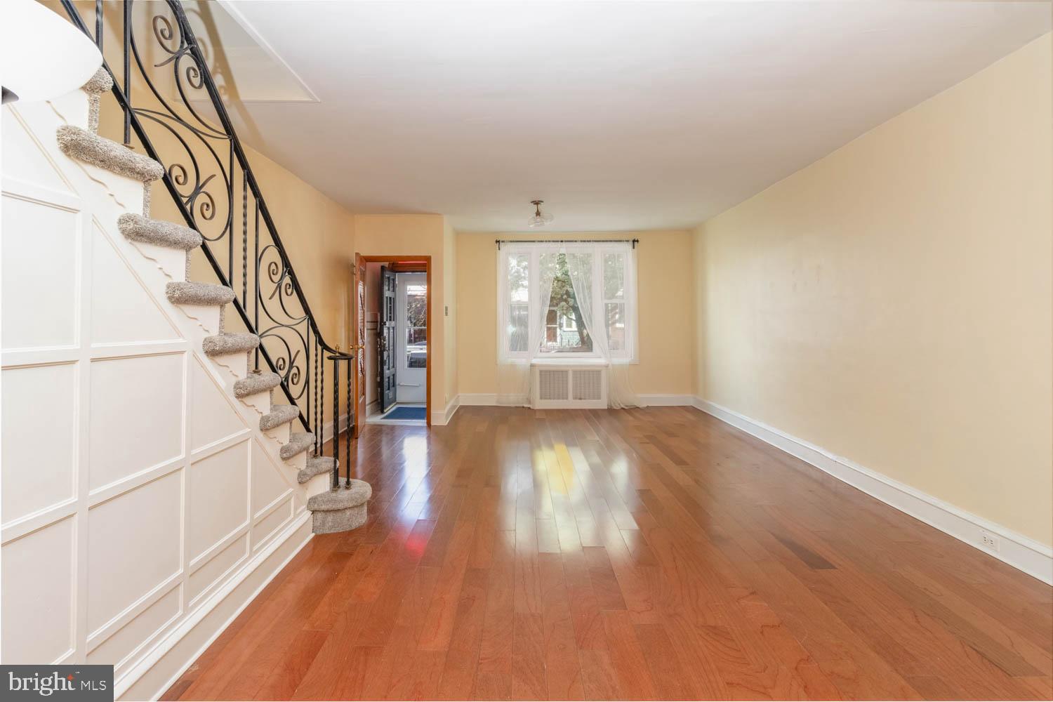820 Tasker Street Philadelphia, PA 19148 - Photo 6 of 25 a view of an entryway with wooden floor