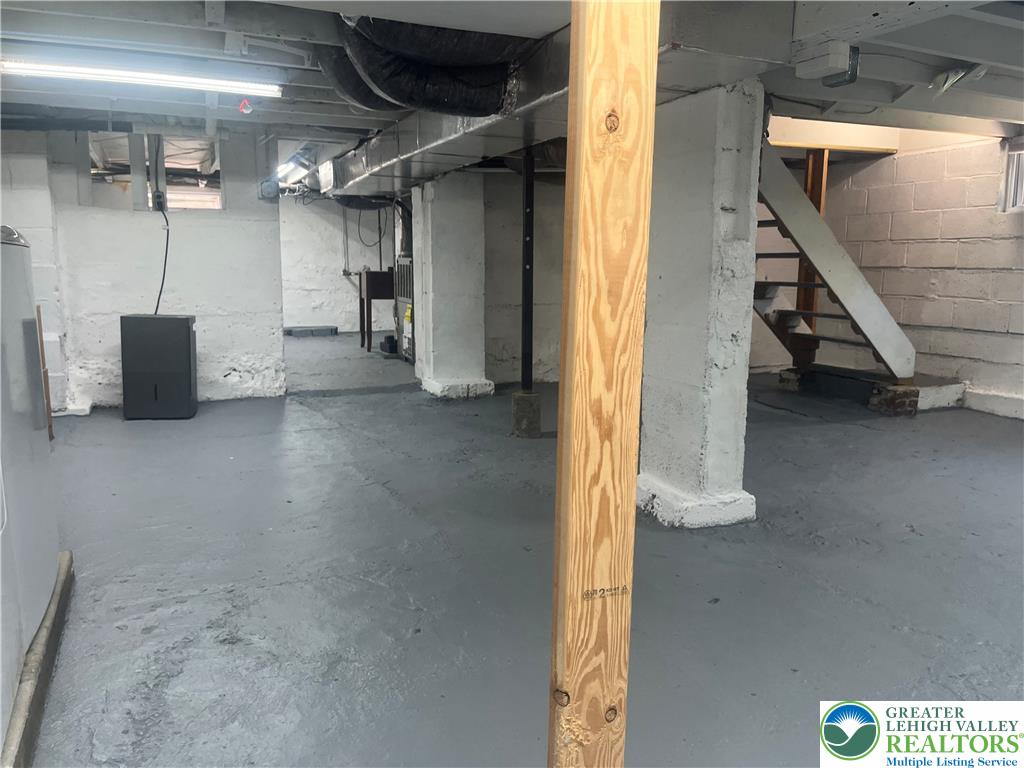 1839 Willow Park Road Bethlehem, PA 18020 - Photo 24 of 35 A well-maintained basement with painted concrete floors offers generous storage and utility space.