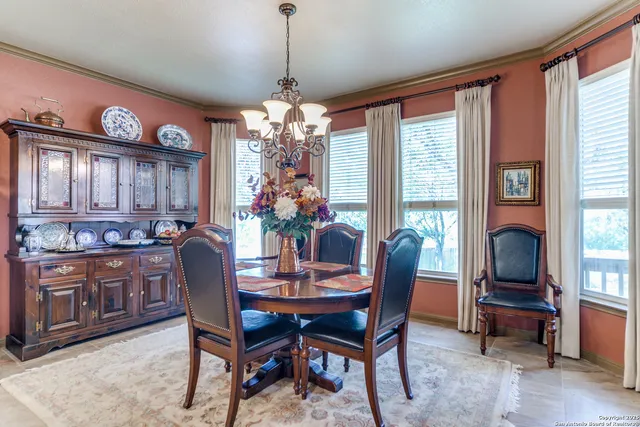 a kitchen with a sink cabinets and window