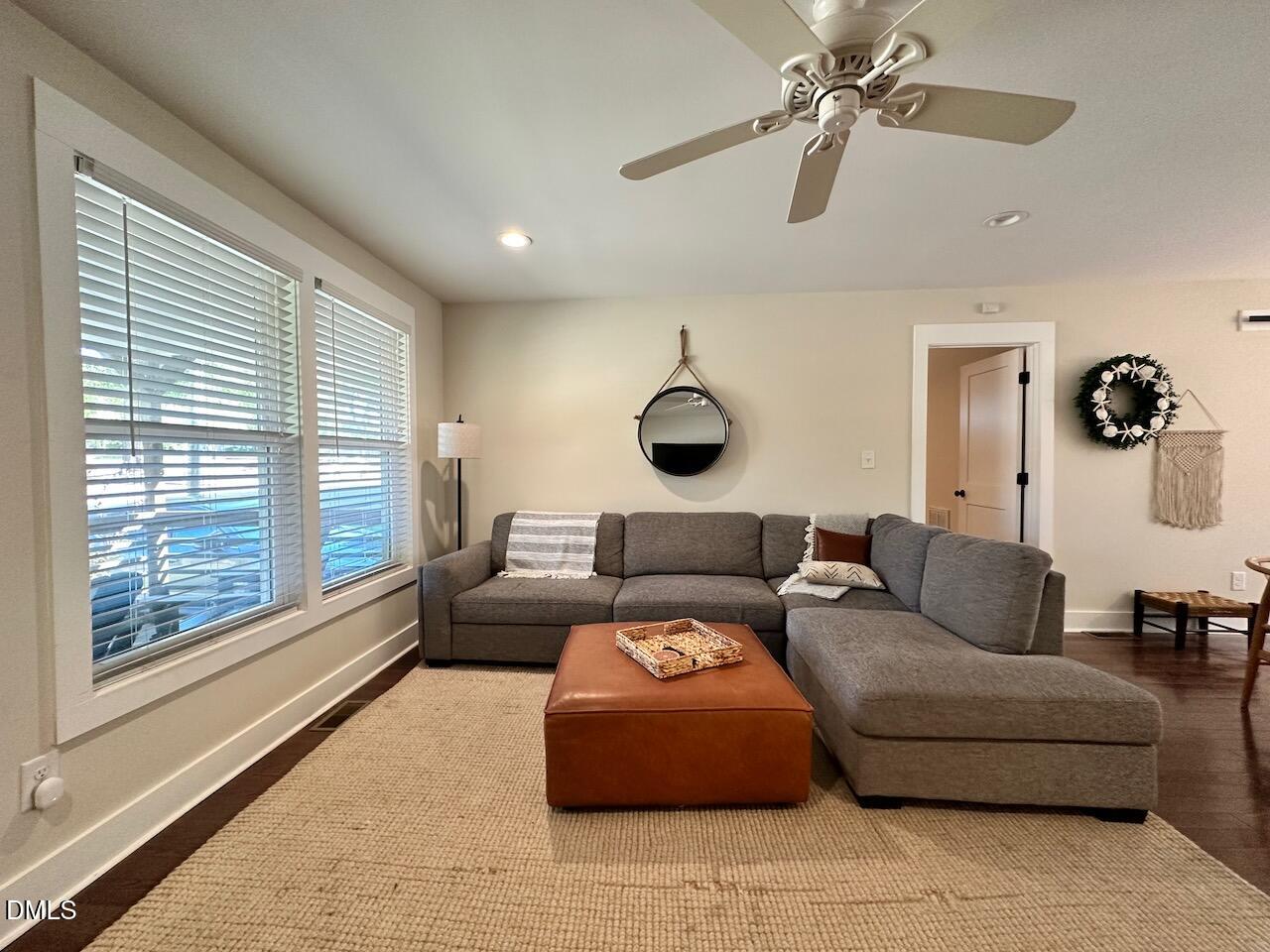 1006 East Martin Street Raleigh, NC 27601 - Photo 4 of 22 a living room with furniture and a large window