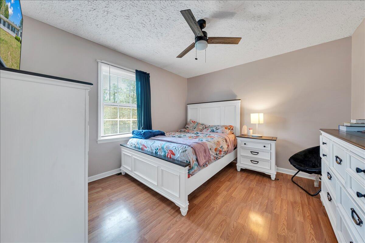 3870 Goose Dam Road Rocky Mount, VA 24151 - Photo 28 of 44 a bedroom with a bed and a dresser