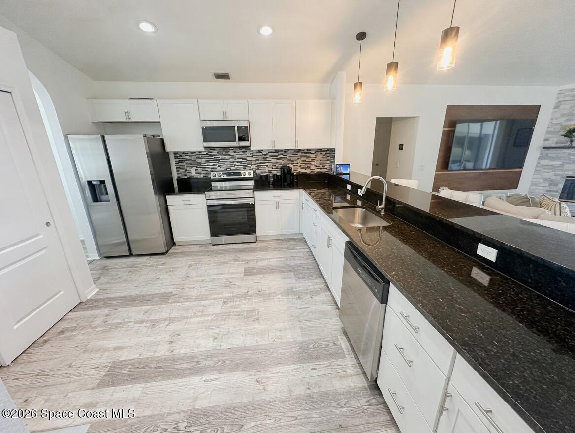 704 Carriage Hill Road Melbourne, FL 32940 - Photo 14 of 59 kitchen