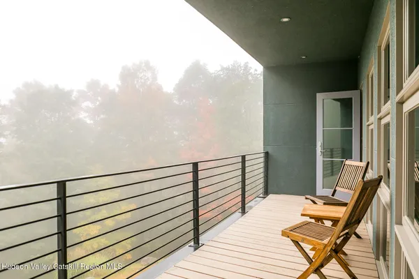 a view of outdoor sitting area with furniture
