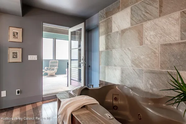 a view of a couches and a table in the patio