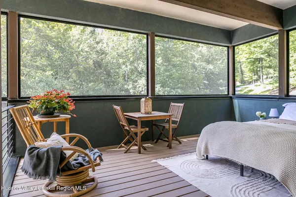 a living room with furniture and windows