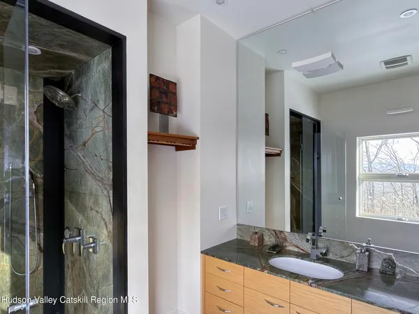 a view of balcony with wooden floor