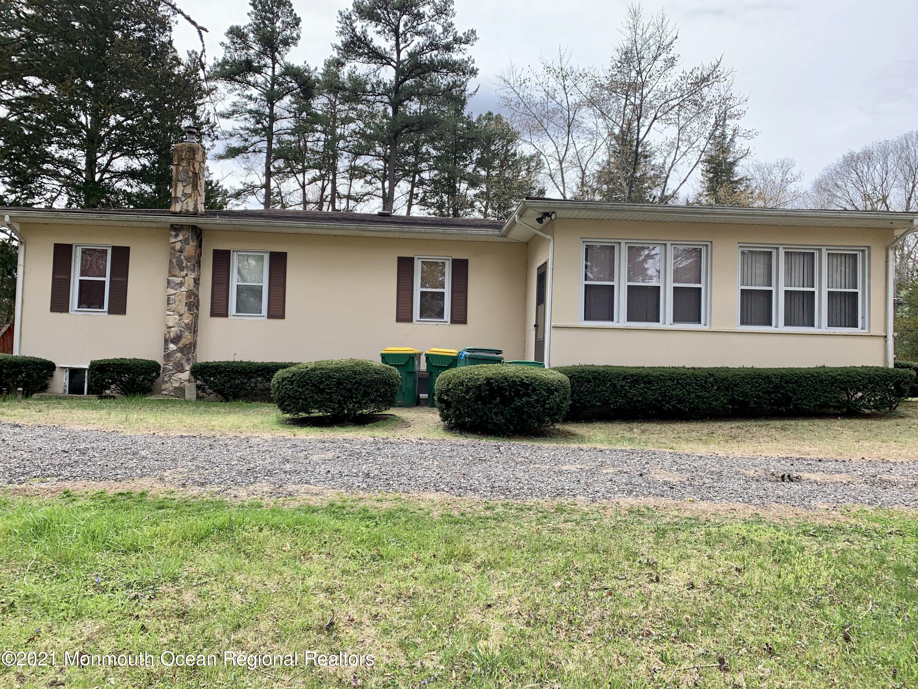 360 East Millstream Road Cream Ridge, NJ 08514 - Photo 2 of 9 a house view with a garden space
