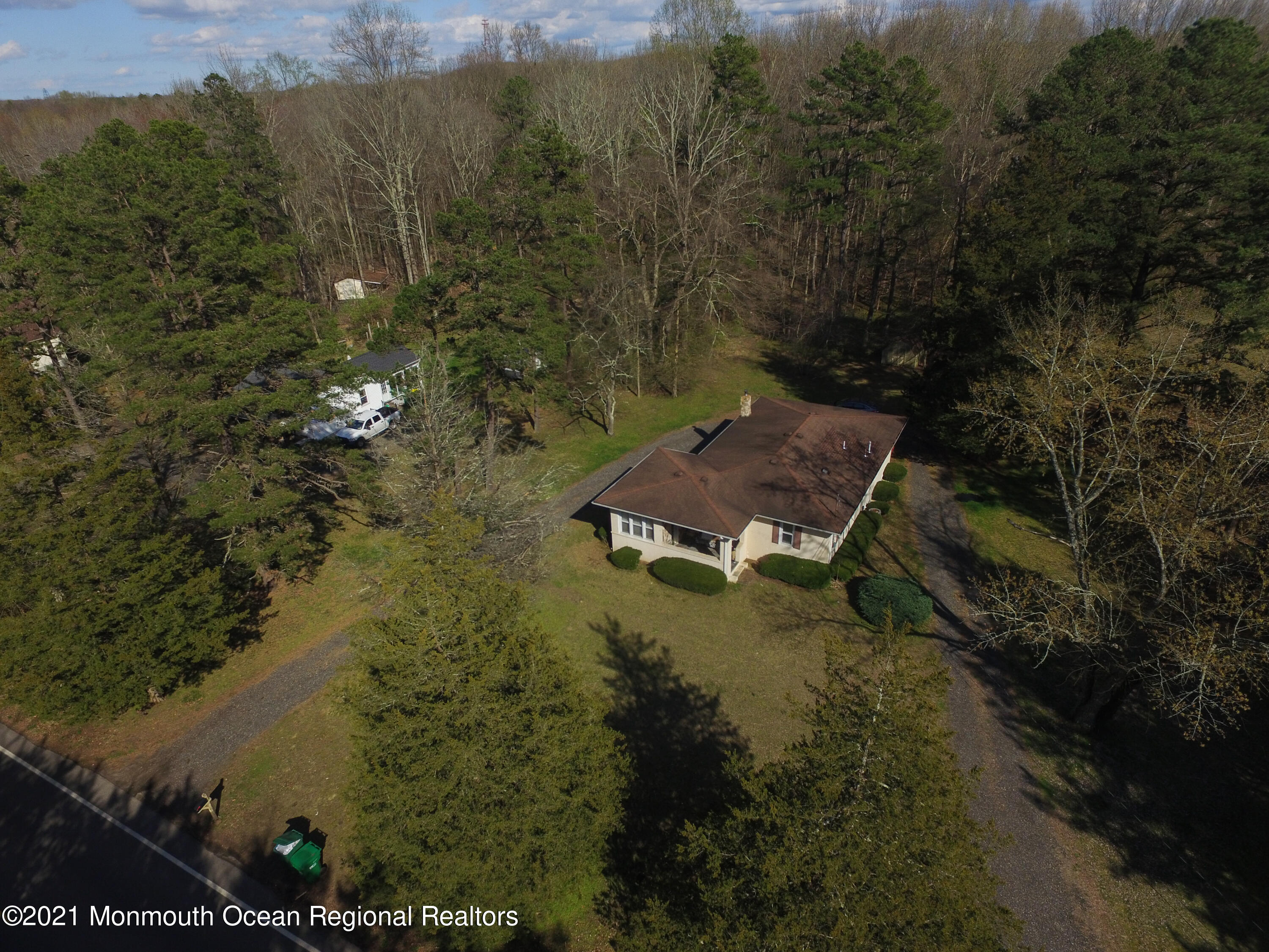 360 East Millstream Road Cream Ridge, NJ 08514 - Photo 4 of 9 an aerial view of a house with a yard