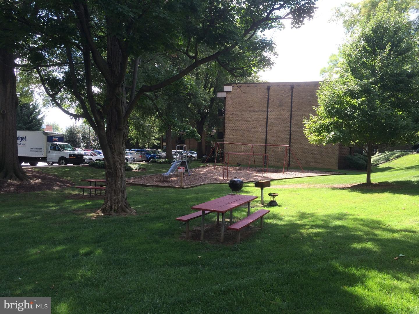 2113 Walsh View Terrace, Unit 302 Silver Spring, MD 20902 - Photo 19 of 23 Tot lots and picnic tables.