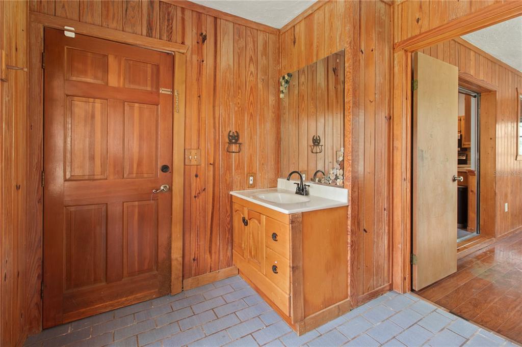 1143 Meyers Road Venice, FL 34292 - Photo 16 of 59 a bathroom with a sink and a mirror