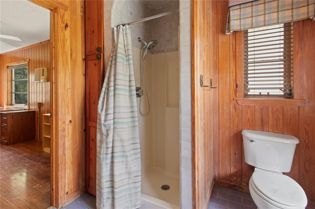 1143 Meyers Road Venice, FL 34292 - Photo 17 of 59 a bathroom with a toilet and a shower