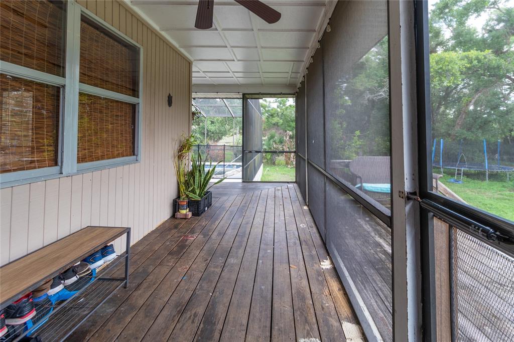 1143 Meyers Road Venice, FL 34292 - Photo 26 of 59 a view of outdoor space with wooden floor and outdoor seating