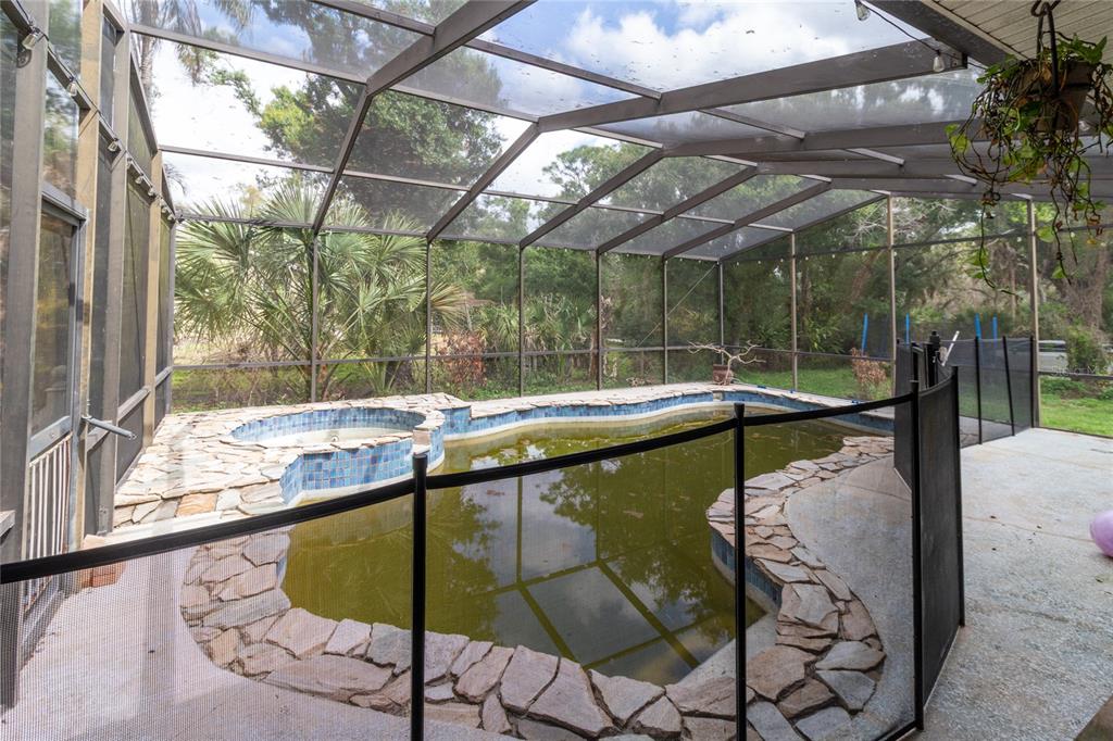 1143 Meyers Road Venice, FL 34292 - Photo 31 of 59 a swimming pool with outdoor seating and yard