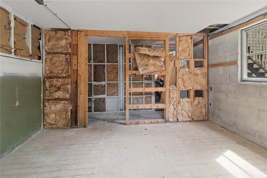 1143 Meyers Road Venice, FL 34292 - Photo 35 of 59 a view of an empty room with a empty shelves