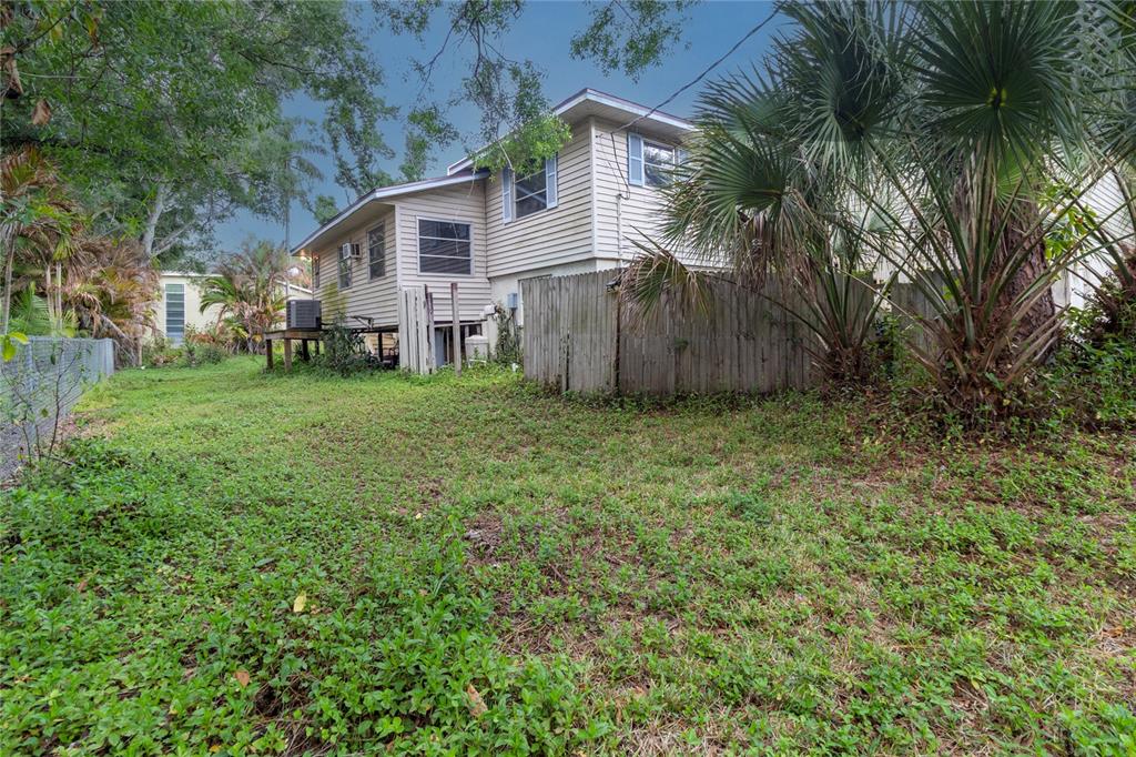 1143 Meyers Road Venice, FL 34292 - Photo 45 of 59 a view of a house with a yard