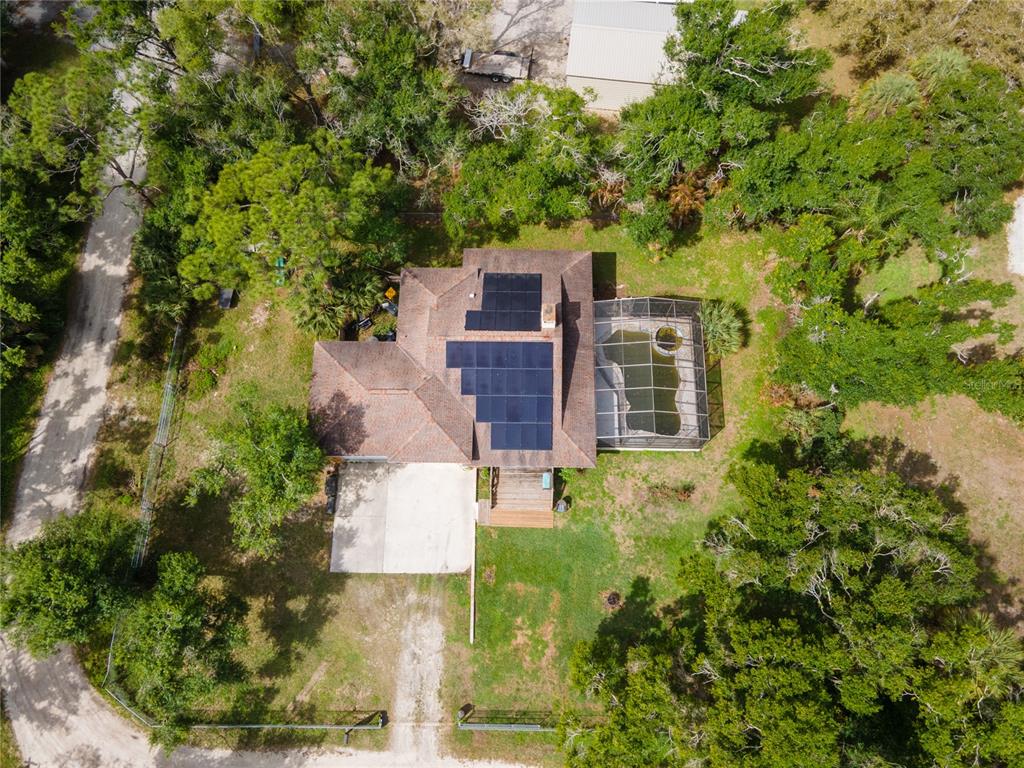 1143 Meyers Road Venice, FL 34292 - Photo 51 of 59 an aerial view of a house with a yard