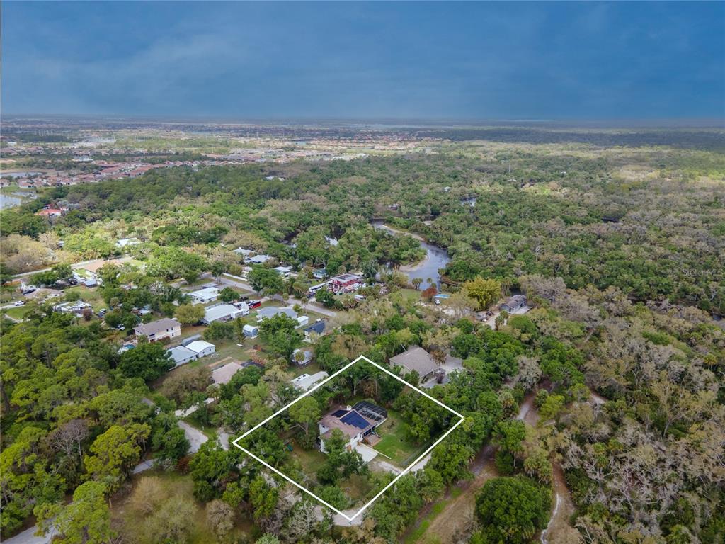1143 Meyers Road Venice, FL 34292 - Photo 58 of 59 a view of a field with an ocean