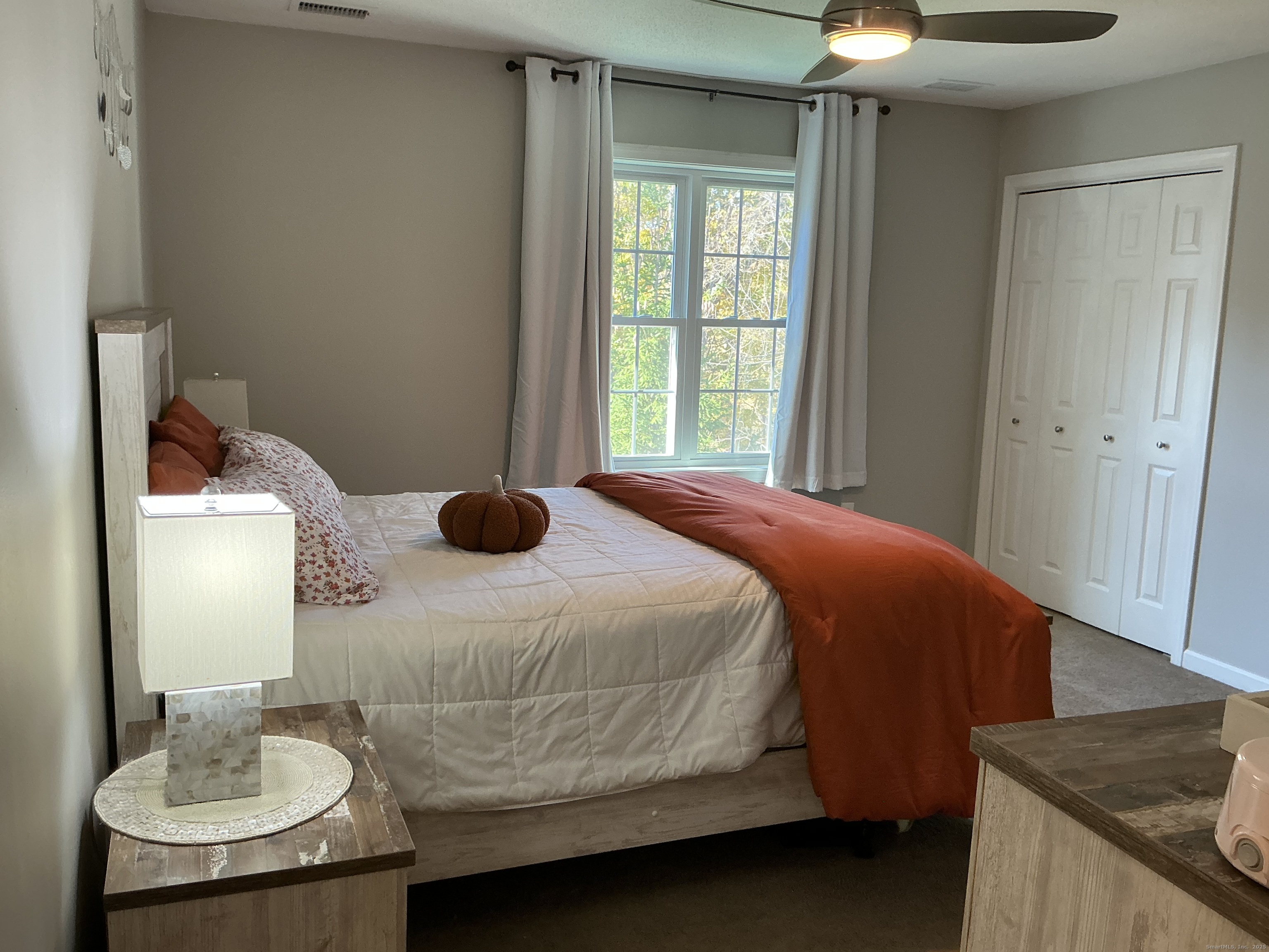 751 Long Hill Road, Unit D Middletown, CT 06457 - Photo 15 of 28 a bedroom with a bed and dresser