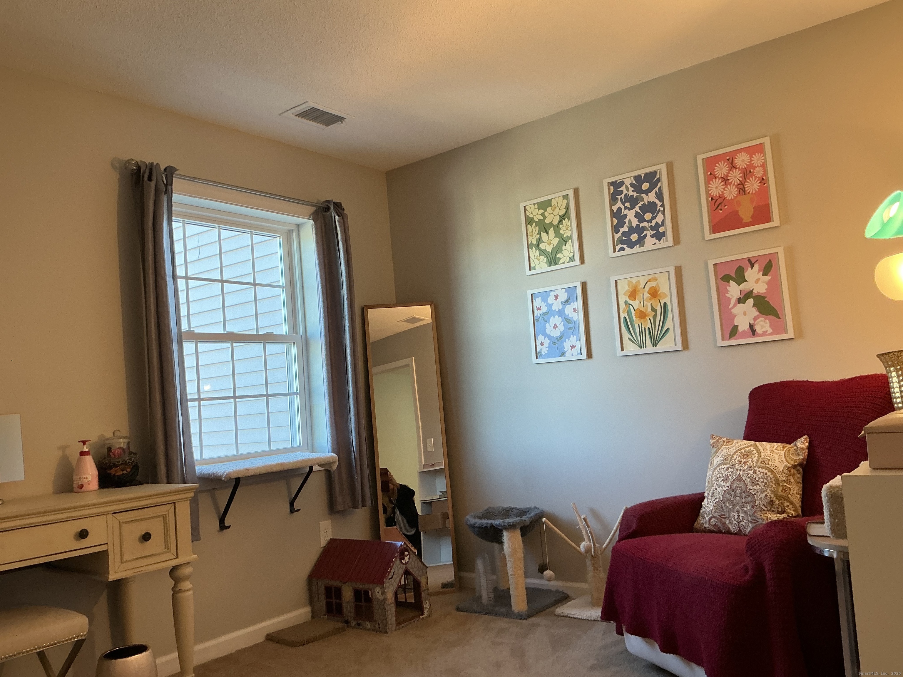 751 Long Hill Road, Unit D Middletown, CT 06457 - Photo 16 of 28 a livingroom with window and a couch