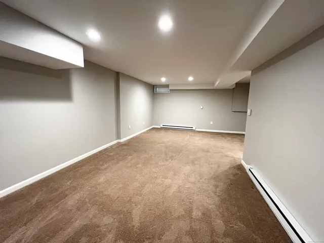 an empty room with a workbench