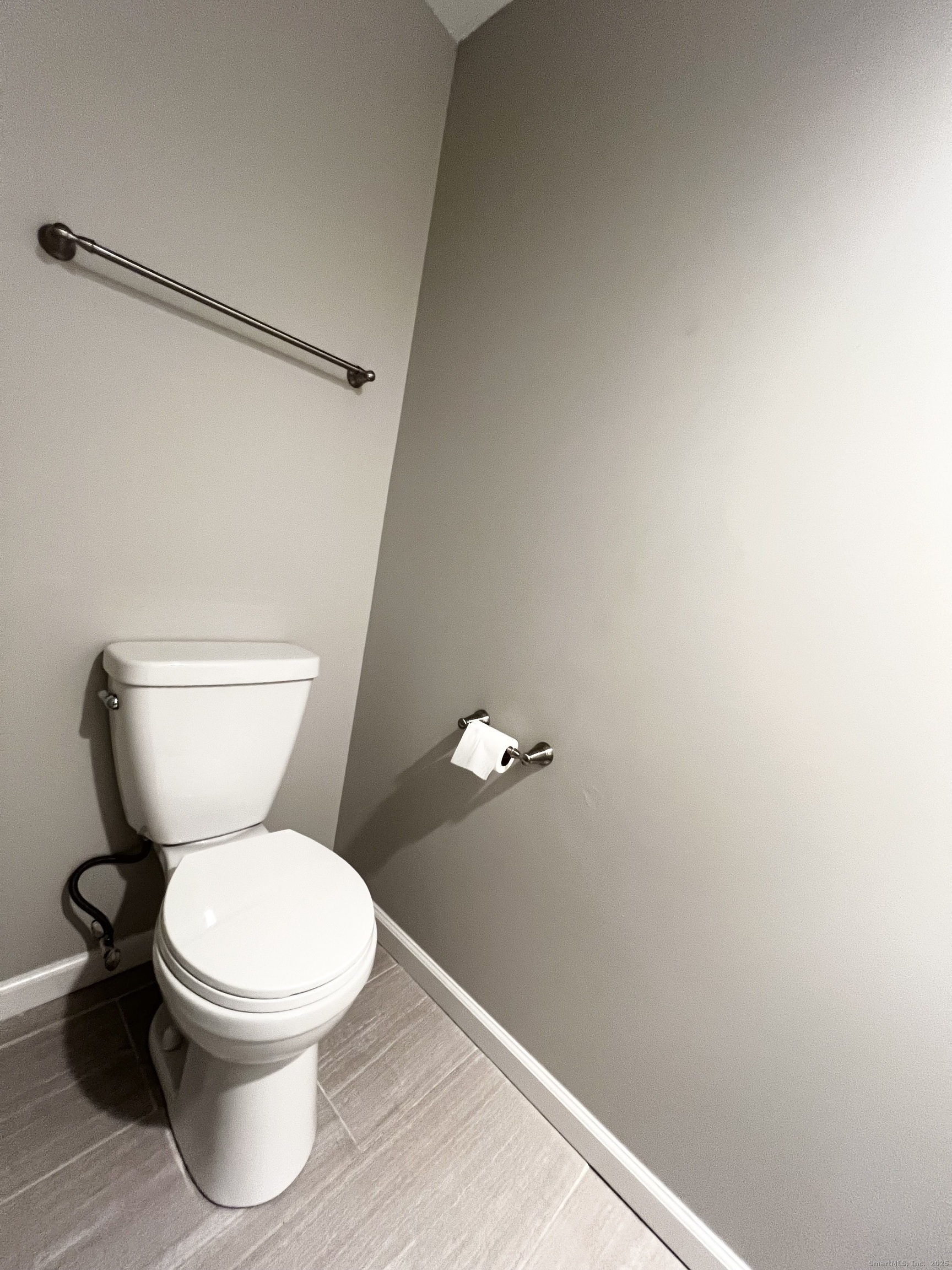 751 Long Hill Road, Unit D Middletown, CT 06457 - Photo 23 of 28 a white toilet sitting next to a shower