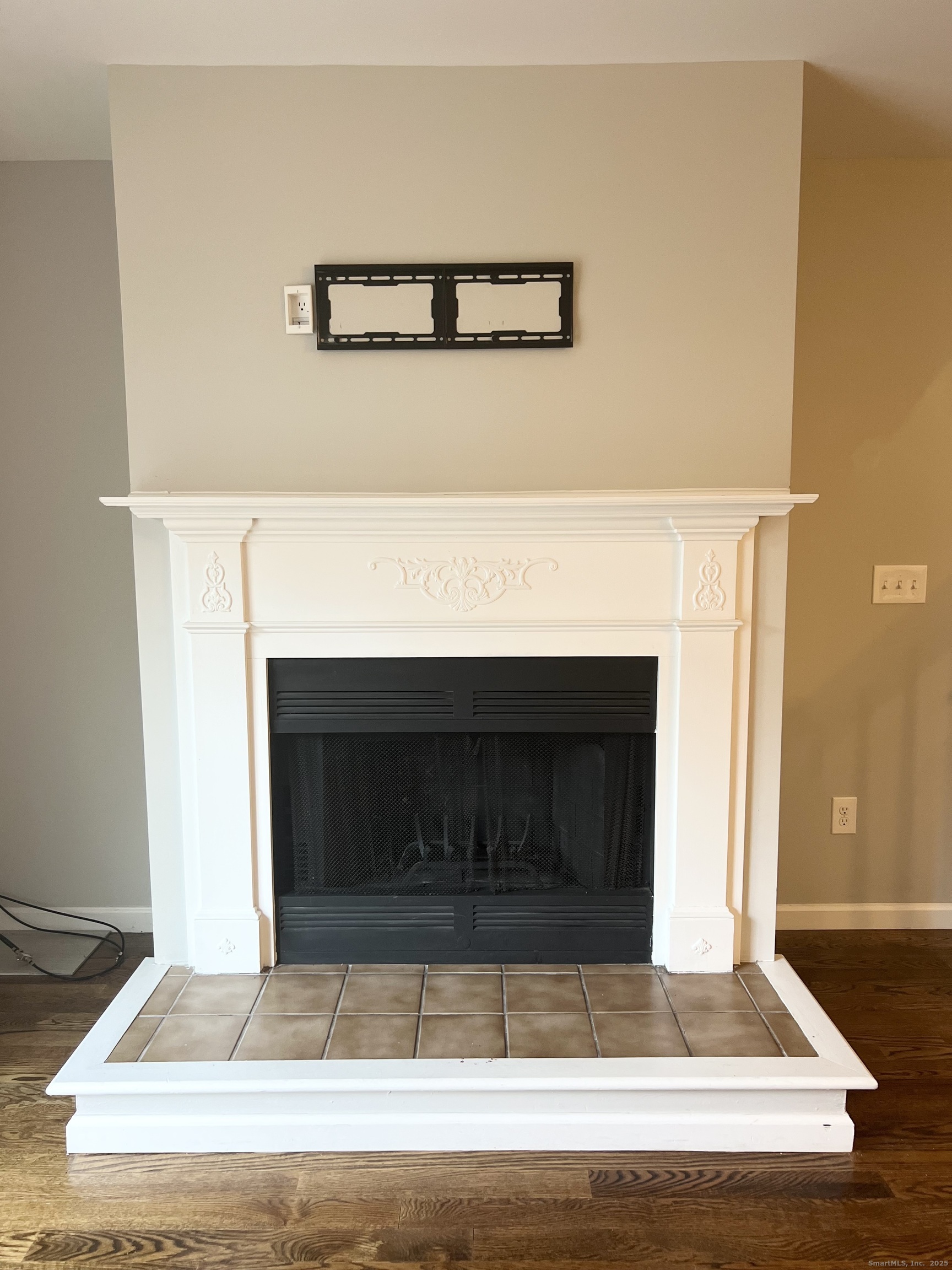 751 Long Hill Road, Unit D Middletown, CT 06457 - Photo 7 of 28 a living room with a fireplace