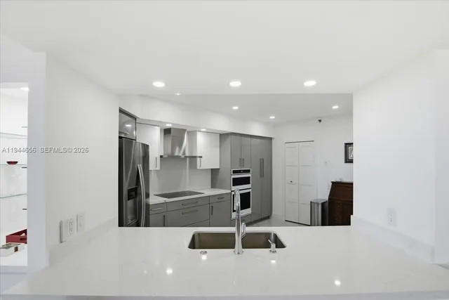 a bathroom with a tub and shower