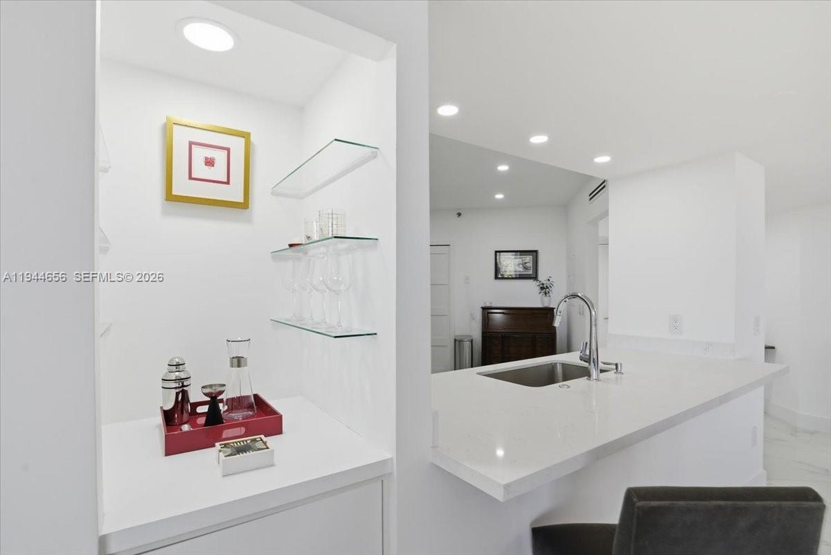 8925 Collins Avenue, Unit 9F Surfside, FL 33154 - Photo 30 of 73 a bathroom with a tub and a shower