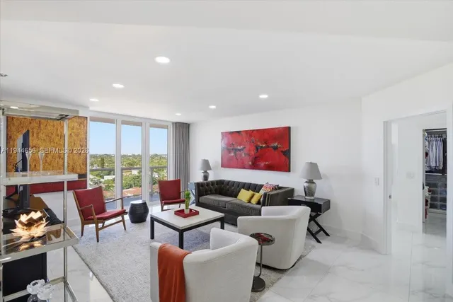 a view of a swimming pool with a yard