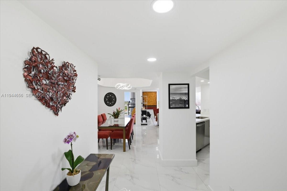 8925 Collins Avenue, Unit 9F Surfside, FL 33154 - Photo 43 of 73 a living room with furniture and wooden floor