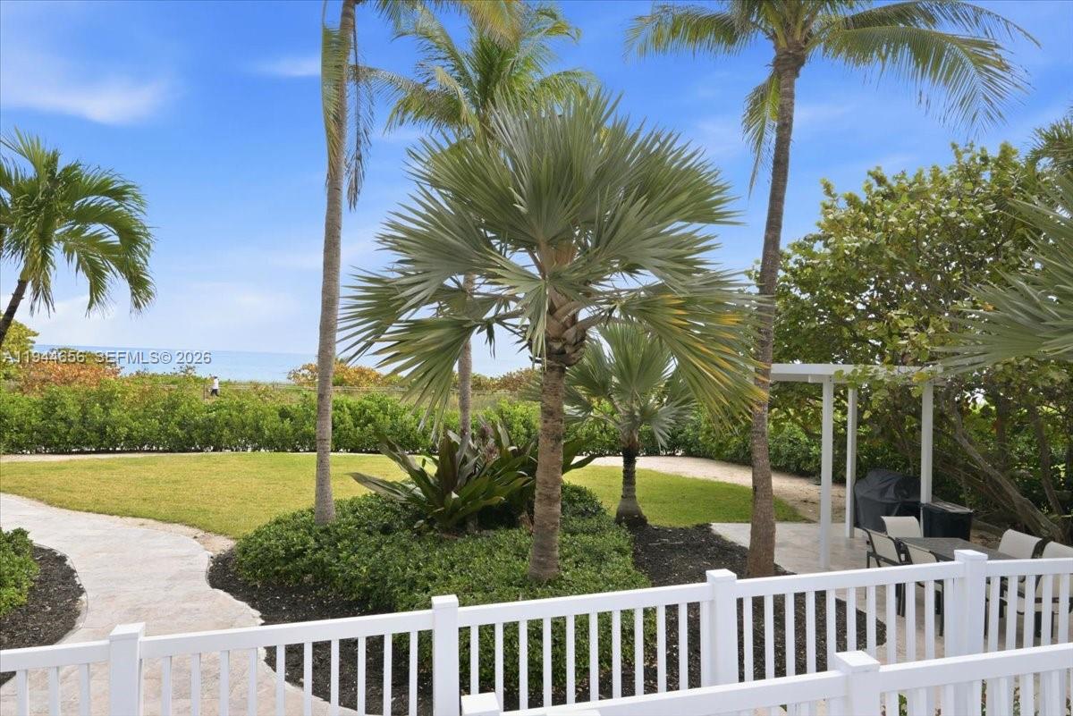 8925 Collins Avenue, Unit 9F Surfside, FL 33154 - Photo 48 of 73 a view of a yard with a house