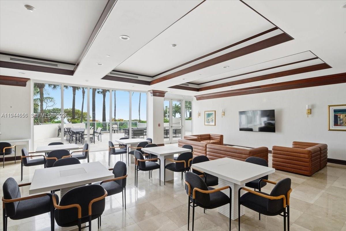 8925 Collins Avenue, Unit 9F Surfside, FL 33154 - Photo 56 of 73 a view of a dining room with furniture window and outside view