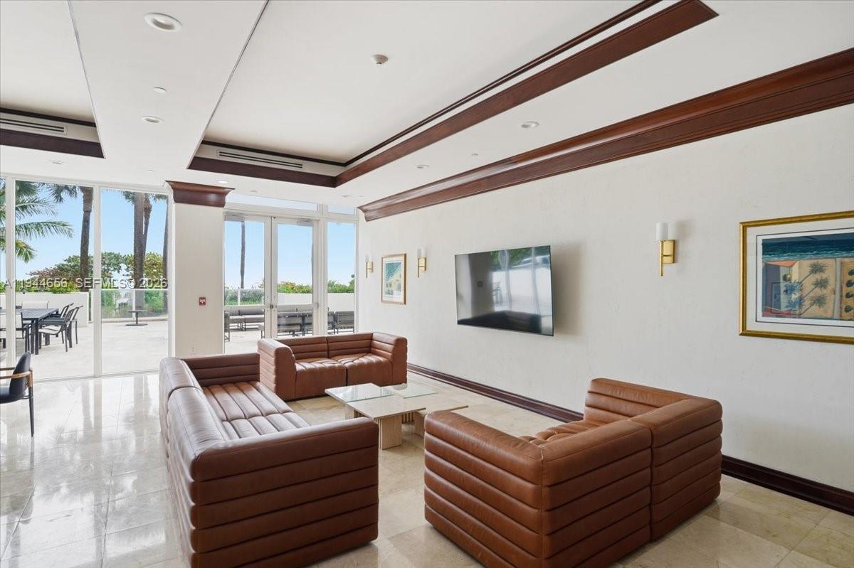 8925 Collins Avenue, Unit 9F Surfside, FL 33154 - Photo 58 of 73 a living room with furniture