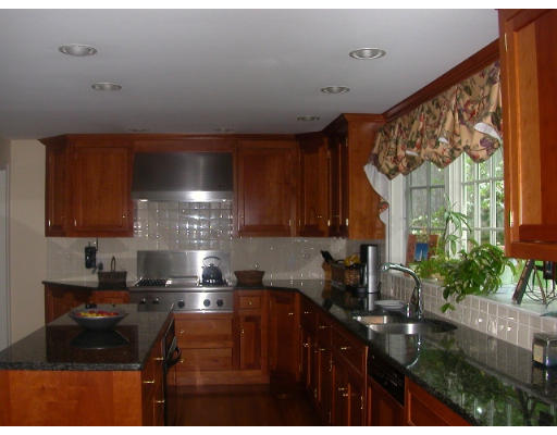 30 Allen Road Winchester, MA 01890 - Photo 4 of 9 a kitchen with a sink and cabinets