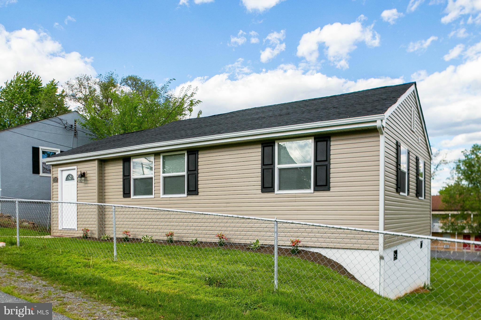 207 South Reymann Street Ranson, WV 25438 - Photo 4 of 24 a view of a house with a yard